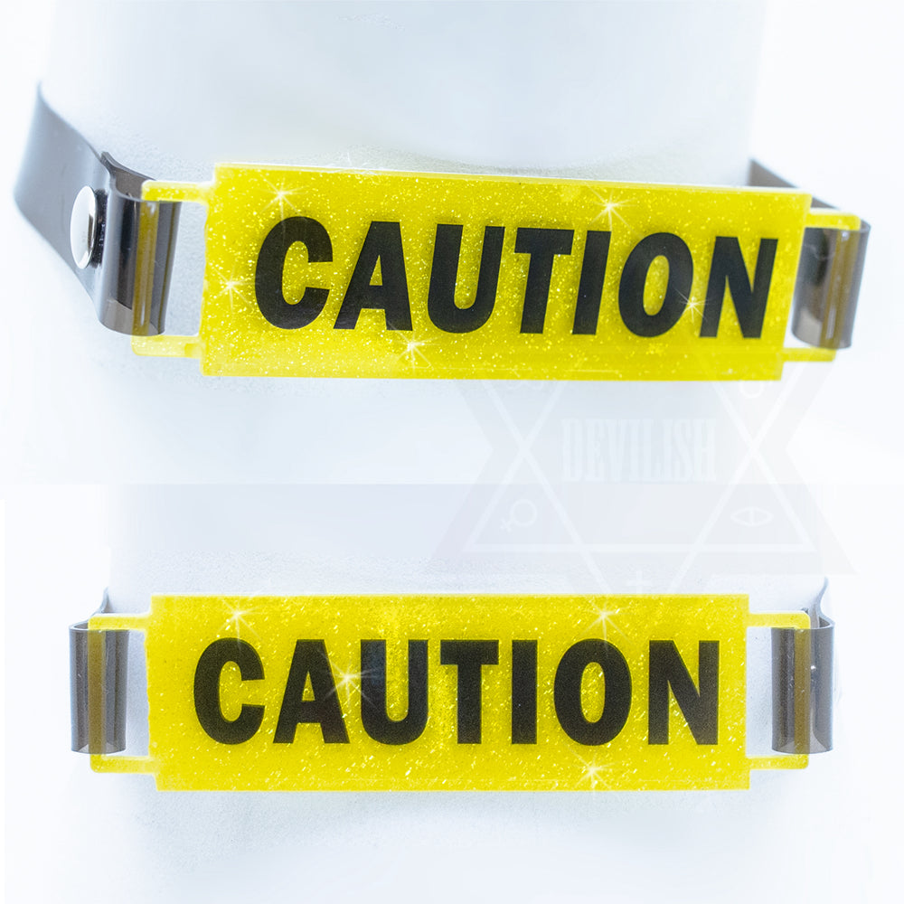 CAUTION choker